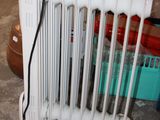 a radiator that is sitting on the floor in a garage