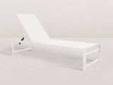 a white chaise lounger sitting on top of a white floor