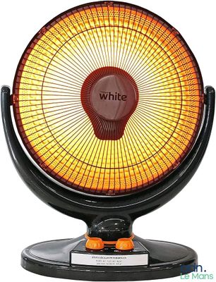 une photo d'un radiateur noir et orange posé sur une table