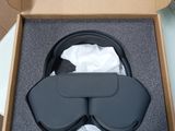 a cardboard box with a pair of glasses inside of it