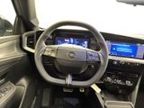 the interior of a car with a steering wheel, dashboard, and dash board