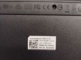 a close up of the back of a laptop computer with a qr code on it
