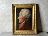 portrait d'un homme aux cheveux blancs vêtu d'un manteau rouge