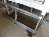 an image of a metal work bench in a garage