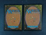 two decks of magic the gathering deck are shown on a table
