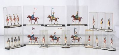 a lot of miniature figurines of people riding horses