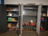 a metal cabinet with a door open in a garage