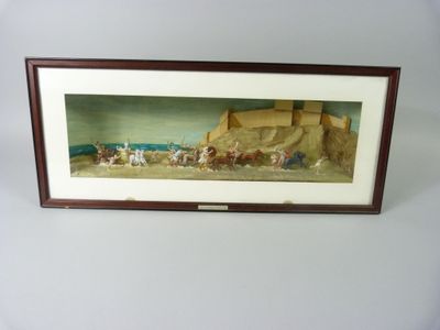 tableau encadré représentant un groupe de personnes sur une plage
