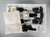 a remote control racing car in a box