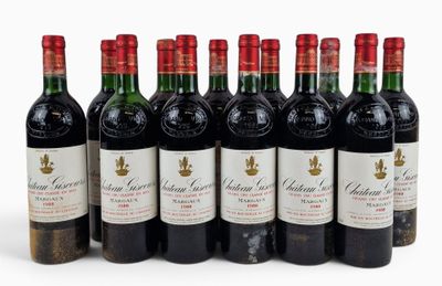 six bottles of red wine lined up in a row on a white surface