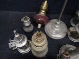 many different types of old gas pumps on the floor
