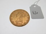 gros plan d'une pièce de monnaie portant une étiquette de prix