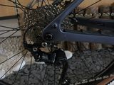 a close up of a bicycle with a chain on the front wheel