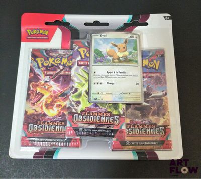 gros plan d'une boîte de cartes pokemon sur une table
