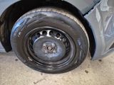 a close up of a tire on a car ' s rim