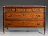 an antique chest of drawers with marble top and brass handles