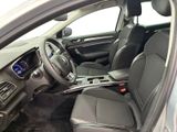 the interior of a car with a steering wheel and dashboard controls