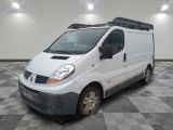 a white van that is parked on a checkered floor