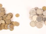 a lot of coins that are on the table