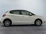 a picture of a white car parked in a parking lot