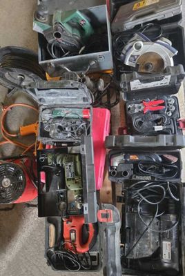 a lot of tools that are sitting on the floor