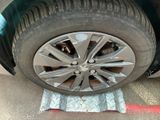 a close up of a tire on the ground