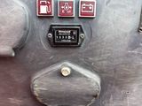 a close up of a machine with buttons on it