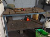 an image of a workbench with tools on it