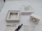 a white box that has a charger and a charger in it