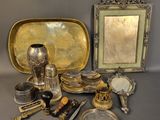 an image of a collection of antique silverware on a table