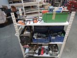 many tools on the shelf in the garage