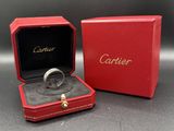 an image of a cartier ring in a red box