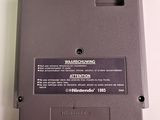 a close up of a nintendo game on a table