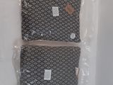 two bags that have been wrapped up on the wall