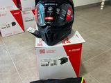 a helmet on top of a box on the floor