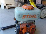 a small machine that is sitting in the garage