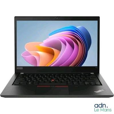 a laptop with a black keyboard sitting on top of a white surface