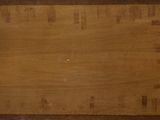 an old wooden box with a handle on it