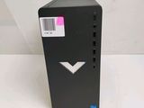 a close up of a black desktop computer on a white surface