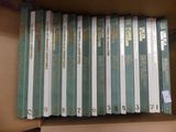 a lot of books that are in a box