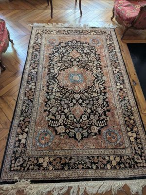 a large rug on the floor in a living room