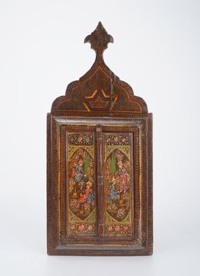 an old wooden cabinet with a painting on the door
