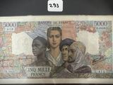 un ancien billet de banque sur lequel figurent trois personnes