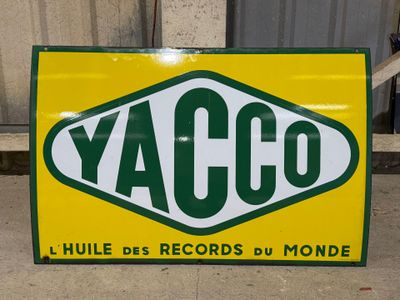 a yellow and green sign that says yaccgo