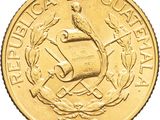 an image of a gold coin with the image of a coat of arms on it