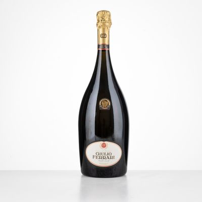 a bottle of champagne on a table with a white background