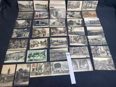 a lot of old postcards that are on the table