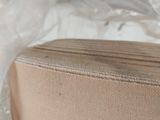 a bag that is wrapped in plastic on a table
