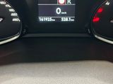 the dashboard of a car with a digital display on it