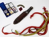 a knife and other items that are on a table